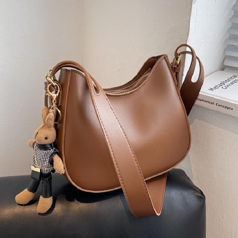 Нишевый дизайн Crescent Сумка Женский рюкзак Одно плечо Универсальная сумка-мессенджер
Нишевый дизайн Crescent Сумка Женский рюкзак Одно плечо Универсальная сумка-мессенджер