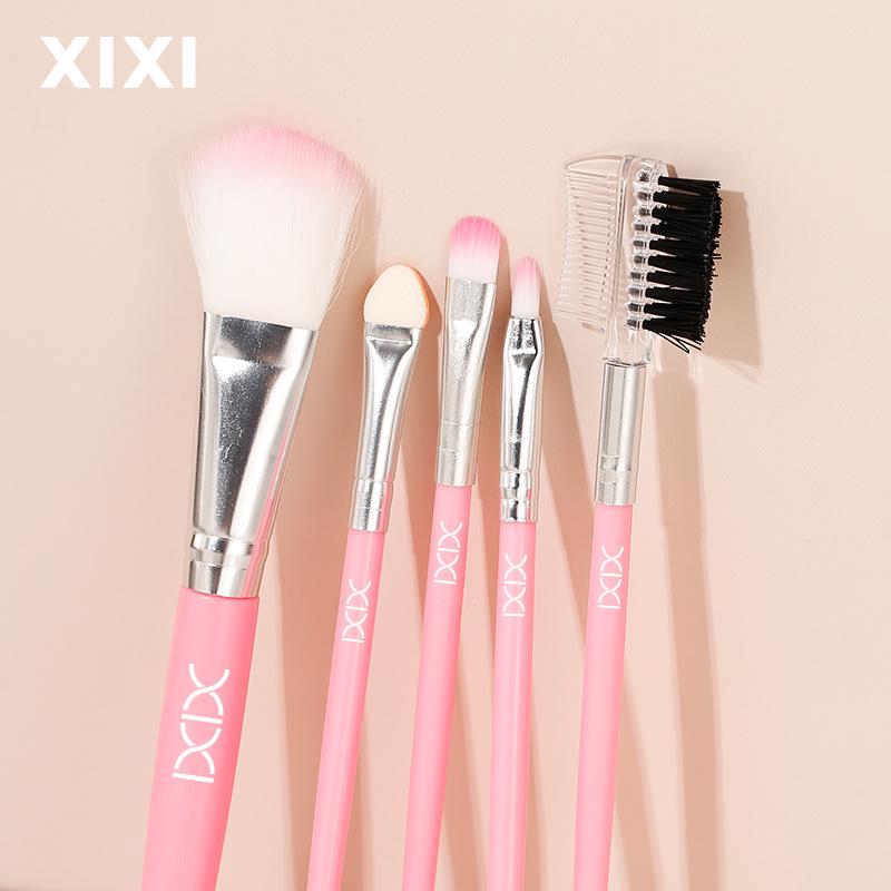 Pink Five-Piece Makeup Brush Set: Includes Eyeshadow, Lip, Blush, Eyelash, and Concealer Brushes.
Pink Five-Piece Makeup Brush Set: Includes Eyeshadow, Lip, Blush, Eyelash, and Concealer Brushes.