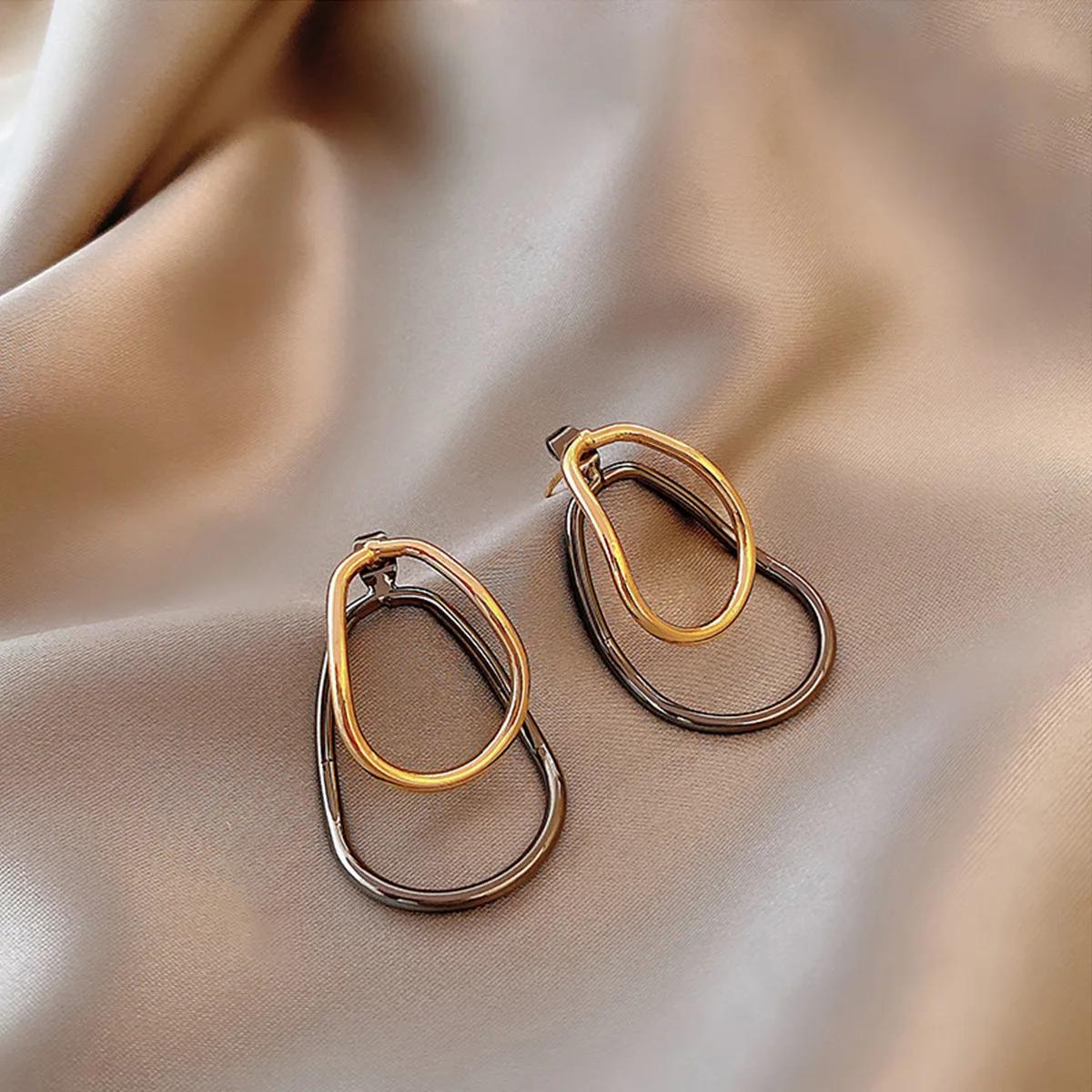 Trend Double Color Irregular Hollow Geometric Egg Shaped Metal Line Drop Earrings for Women Korean Zircon Girl Gift
Trend Double Color Irregular Hollow Geometric Egg Shaped Metal Line Drop Earrings for Women Korean Zircon Girl Gift