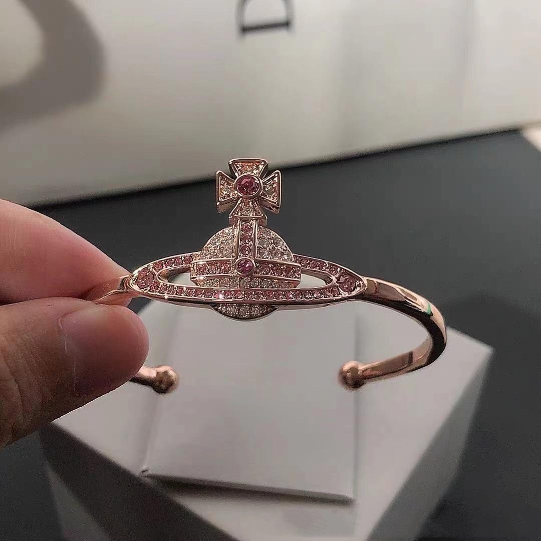 Сатурн Циркон Відкритий браслет: Універсальний геометричний розкішний браслет для жінок
Сатурн Циркон Відкритий браслет: Універсальний геометричний розкішний браслет для жінок