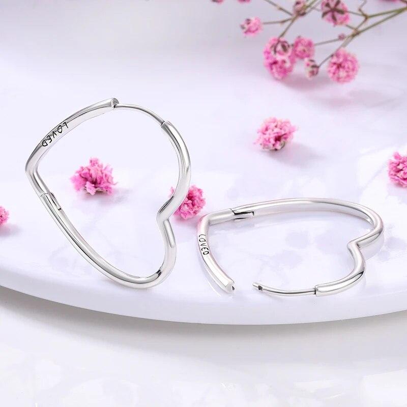 Женские серьги-кольца из серебра 925 пробы, квадратные сверкающие модные серьги в форме сердца, подарок на свадьбу, помолвку, годовщину
Женские серьги-кольца из серебра 925 пробы, квадратные сверкающие модные серьги в форме сердца, подарок на свадьбу, помолвку, годовщину