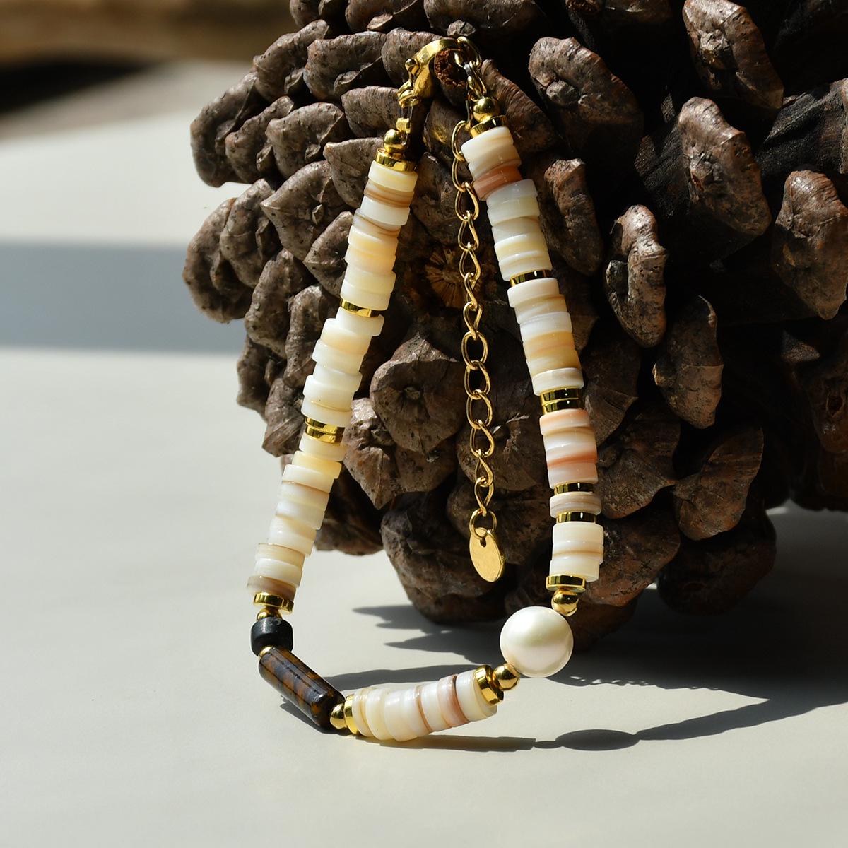 New Fashion Shell Beaded Bracelet with Natural Tiger Eye Stone and Freshwater Pearls - Elegant and Luxurious Design
New Fashion Shell Beaded Bracelet with Natural Tiger Eye Stone and Freshwater Pearls - Elegant and Luxurious Design