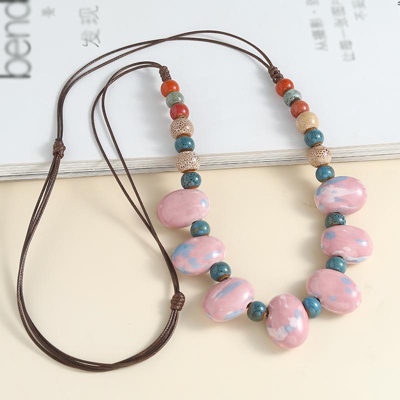 Богемское керамическое ожерелье из бусин - эффектная цепь с подвеской в виде длинного топора и бусинами в стиле народного искусства для свитера, в стиле бохо
Богемское керамическое ожерелье из бусин - эффектная цепь с подвеской в виде длинного топора и бусинами в стиле народного искусства для свитера, в стиле бохо