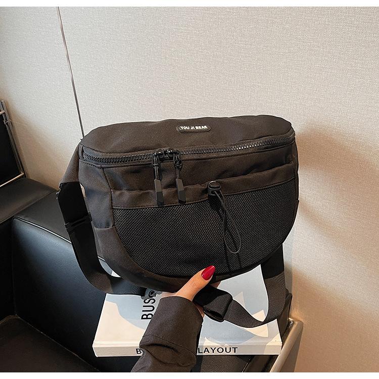 Canvas bag women s large-capacity new summer niche messenger bag sports style premium breast bag чорний
Canvas bag women s large-capacity new summer niche messenger bag sports style premium breast bag чорний