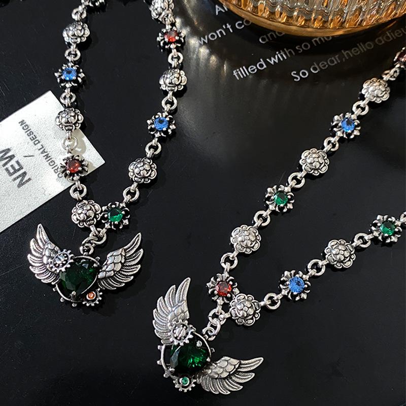 Retro Camellia Wings Pendant Necklace: 2024 Trendy Punk Hip Hop Clavicle Chain Accessories
Retro Camellia Wings Pendant Necklace: 2024 Trendy Punk Hip Hop Clavicle Chain Accessories