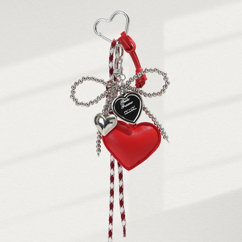 Heart-Shaped Leather Pendant Keychain with Silver Bead & Bowknot Charm червоний
Heart-Shaped Leather Pendant Keychain with Silver Bead & Bowknot Charm червоний