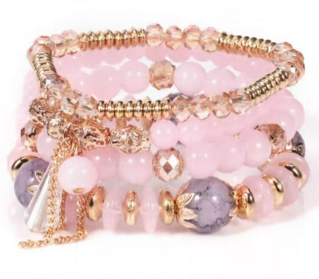 Шикарный женский браслет в стиле бохо с четырьмя слоями стеклянных бусин и кисточками
Шикарный женский браслет в стиле бохо с четырьмя слоями стеклянных бусин и кисточками