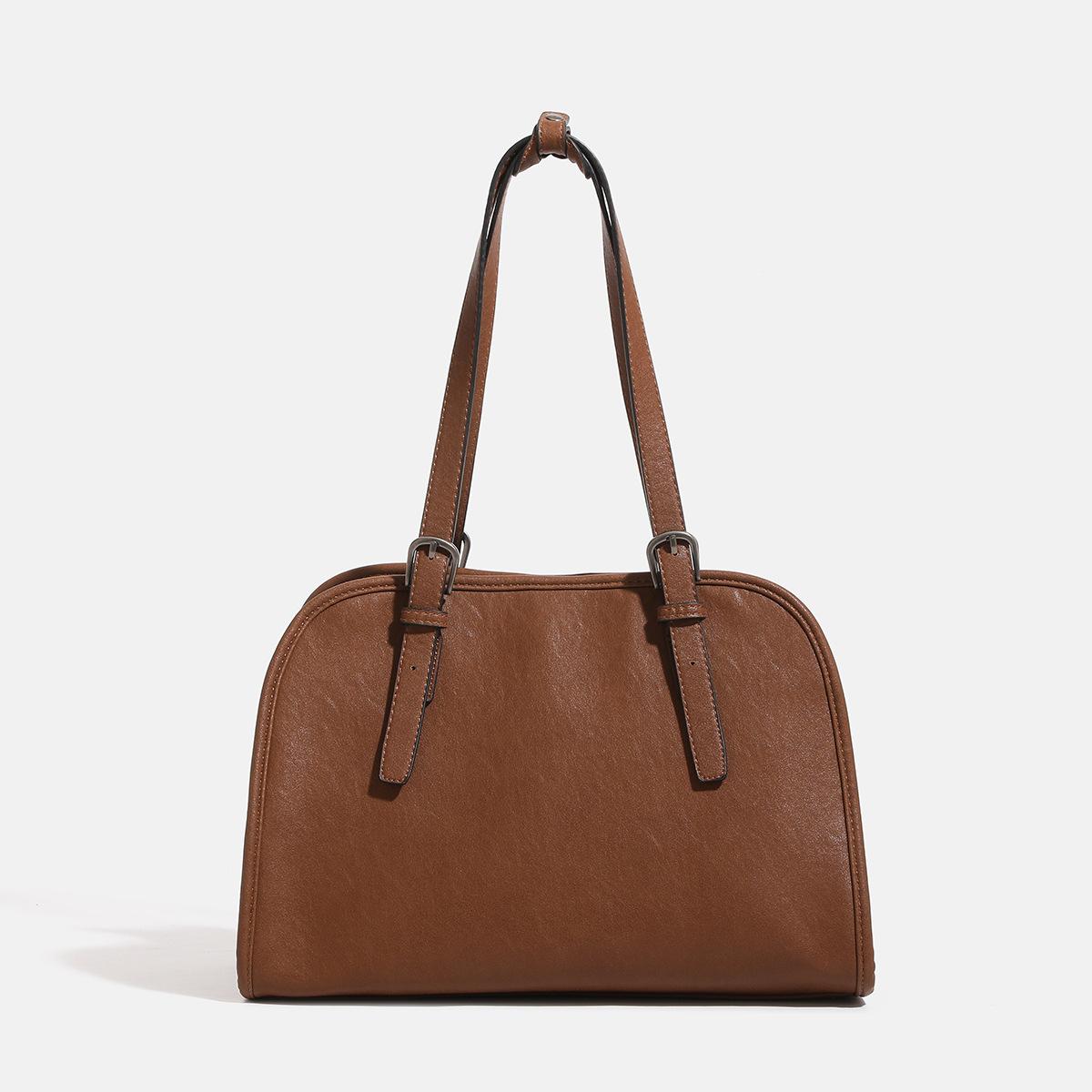 New vegetable tanned ingot bowling bag women s retro large-capacity commuting shoulder underarm messenger bag tote bag 34*16*24
New vegetable tanned ingot bowling bag women s retro large-capacity commuting shoulder underarm messenger bag tote bag 34*16*24