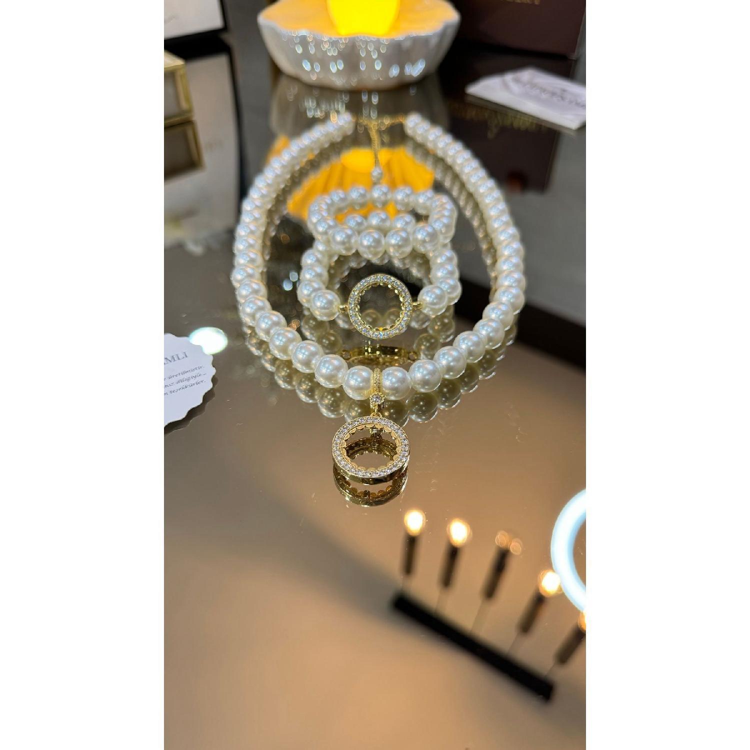 Classic Model Quarter Gold Pearl Necklace And Quarter Gold Bracelet Inci Set (simple Inci Bracelet Gift) вершковий 
Classic Model Quarter Gold Pearl Necklace And Quarter Gold Bracelet Inci Set (simple Inci Bracelet Gift) вершковий