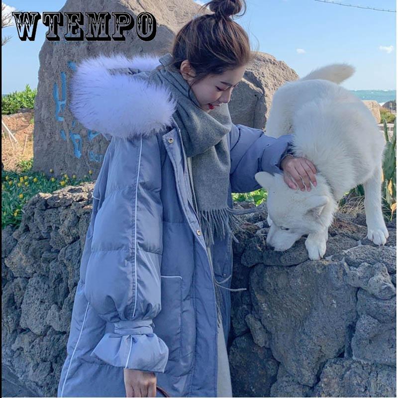 Зимняя женская хлопковая куртка длиной выше колена с большим меховым воротником
Зимняя женская хлопковая куртка длиной выше колена с большим меховым воротником