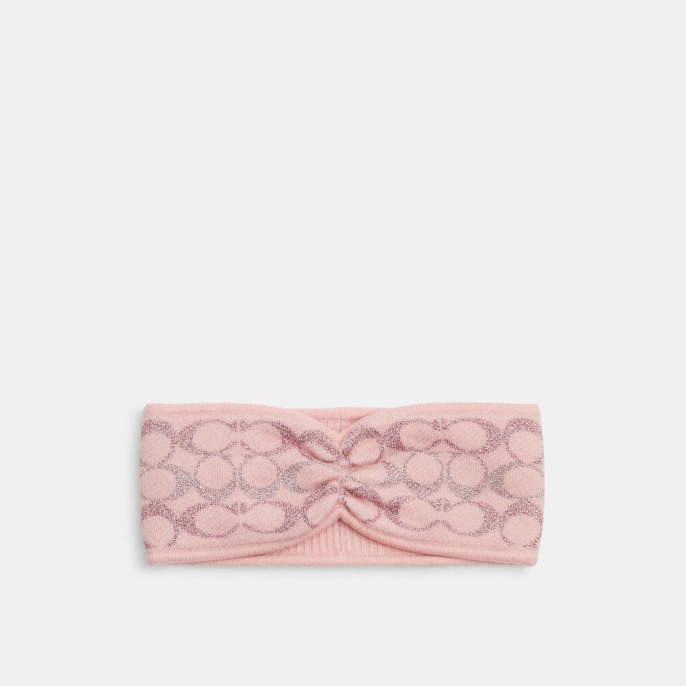 Вязаная повязка на голову Coach Signature с изображением гвоздики металлизированного цвета
Вязаная повязка на голову Coach Signature с изображением гвоздики металлизированного цвета