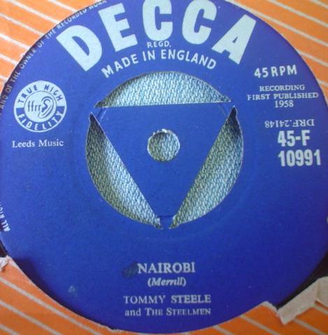 7inch Record TOMMY STEELE & THE STEELMEN - Nairobi / Neon Sign 45F10991 Decca 1958 UK Pop Used
7inch Record TOMMY STEELE & THE STEELMEN - Nairobi / Neon Sign 45F10991 Decca 1958 UK Pop Used