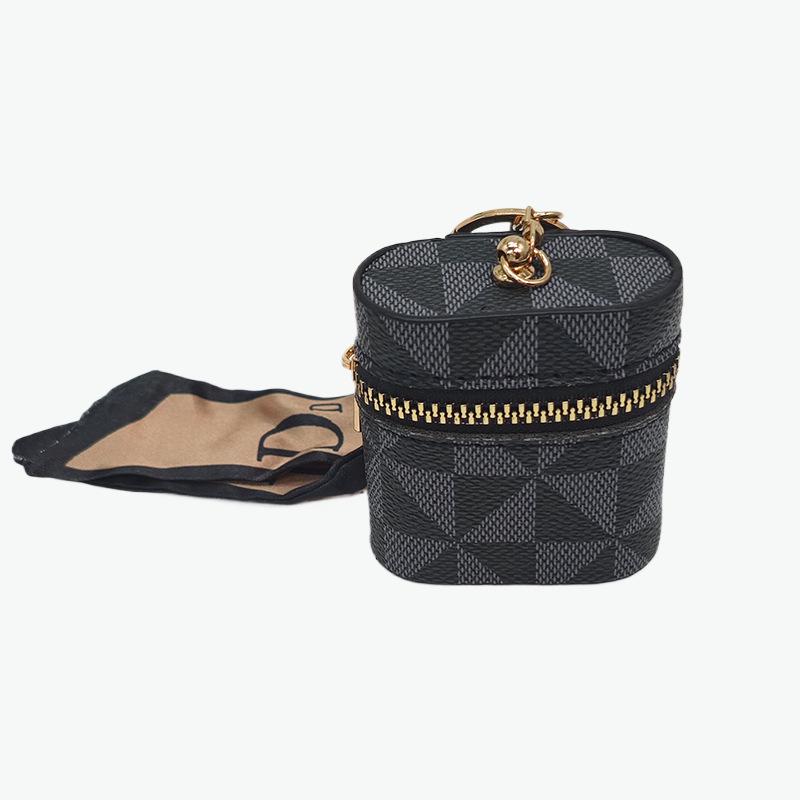 Portable Key & Coin Pouch: Earphone Case & Lipstick Holder with Fashion Key Pendant
Portable Key & Coin Pouch: Earphone Case & Lipstick Holder with Fashion Key Pendant