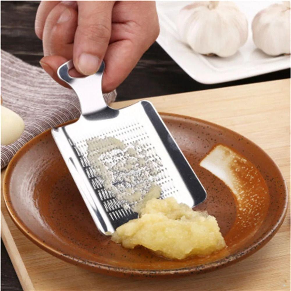 Garlics Peeler Ginger Garlic Crusher Wasabi Grater Crusher Chopper Cutter New Garlic Press Device
Garlics Peeler Ginger Garlic Crusher Wasabi Grater Crusher Chopper Cutter New Garlic Press Device
