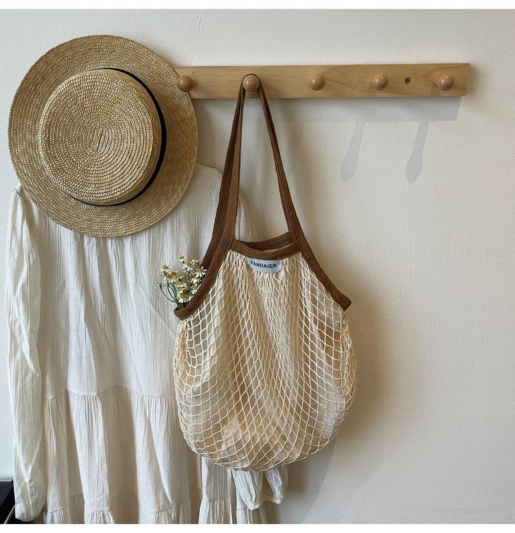 Explosive cotton summer woven hollow handbag women s niche design mesh pocket large-capacity bag women
Explosive cotton summer woven hollow handbag women s niche design mesh pocket large-capacity bag women