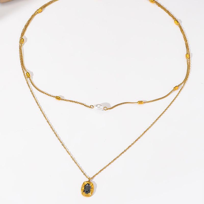 Gold Plated Stainless Steel Double Layer Necklace with Pearl and Black Zircon Pendant for Women
Gold Plated Stainless Steel Double Layer Necklace with Pearl and Black Zircon Pendant for Women