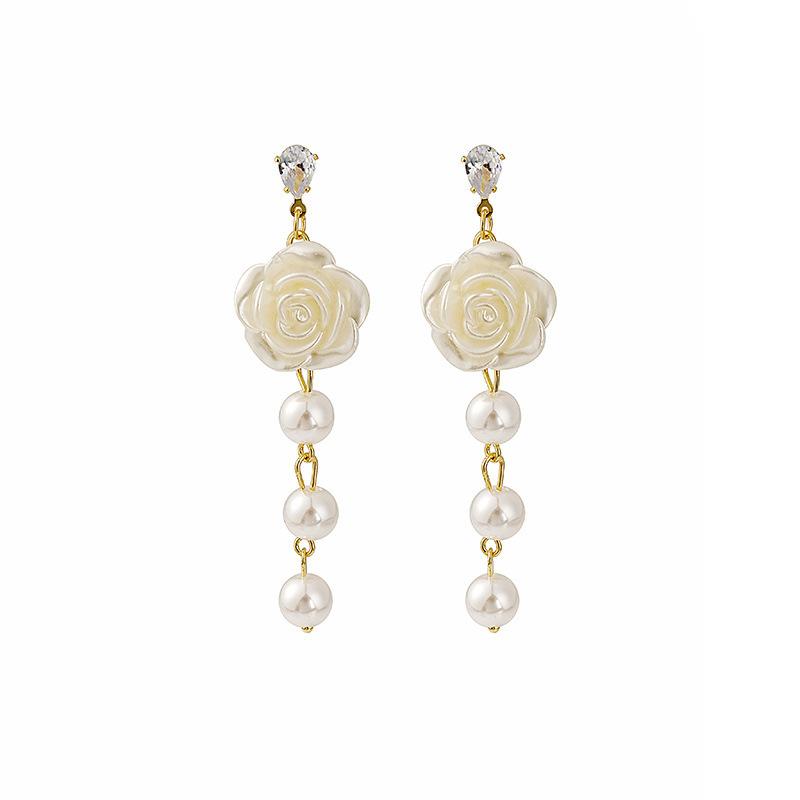 Silver needle super fairy long tassel simulation pearl white rose stud earrings chain type personality beautiful girl earrings золотий
Silver needle super fairy long tassel simulation pearl white rose stud earrings chain type personality beautiful girl earrings золотий