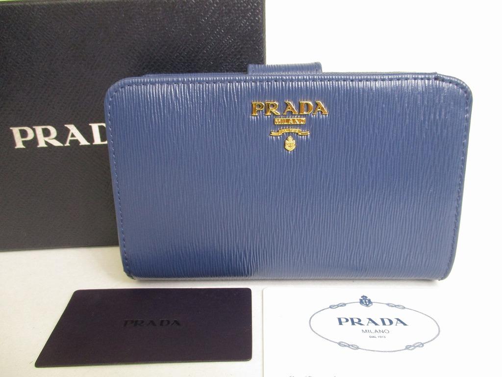 Автентичний шкіряний гаманець PRADA Saffiano Blue із подвійним складенням, компактний гаманець №8777, відремонтований
Автентичний шкіряний гаманець PRADA Saffiano Blue із подвійним складенням, компактний гаманець №8777, відремонтований