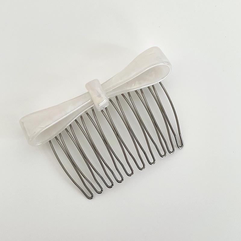 Trendy Anti-Slip Bow Hair Comb & Clip for Elegant Bangs - Stylish Flyaway Hair Accessory
Trendy Anti-Slip Bow Hair Comb & Clip for Elegant Bangs - Stylish Flyaway Hair Accessory