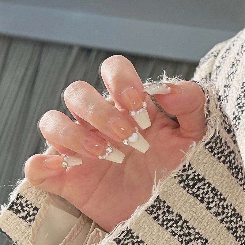 French Medium-Length Milky White Heart Design Press-On Nails with Pearl Chain Finish Stickers Glue-On
French Medium-Length Milky White Heart Design Press-On Nails with Pearl Chain Finish Stickers Glue-On