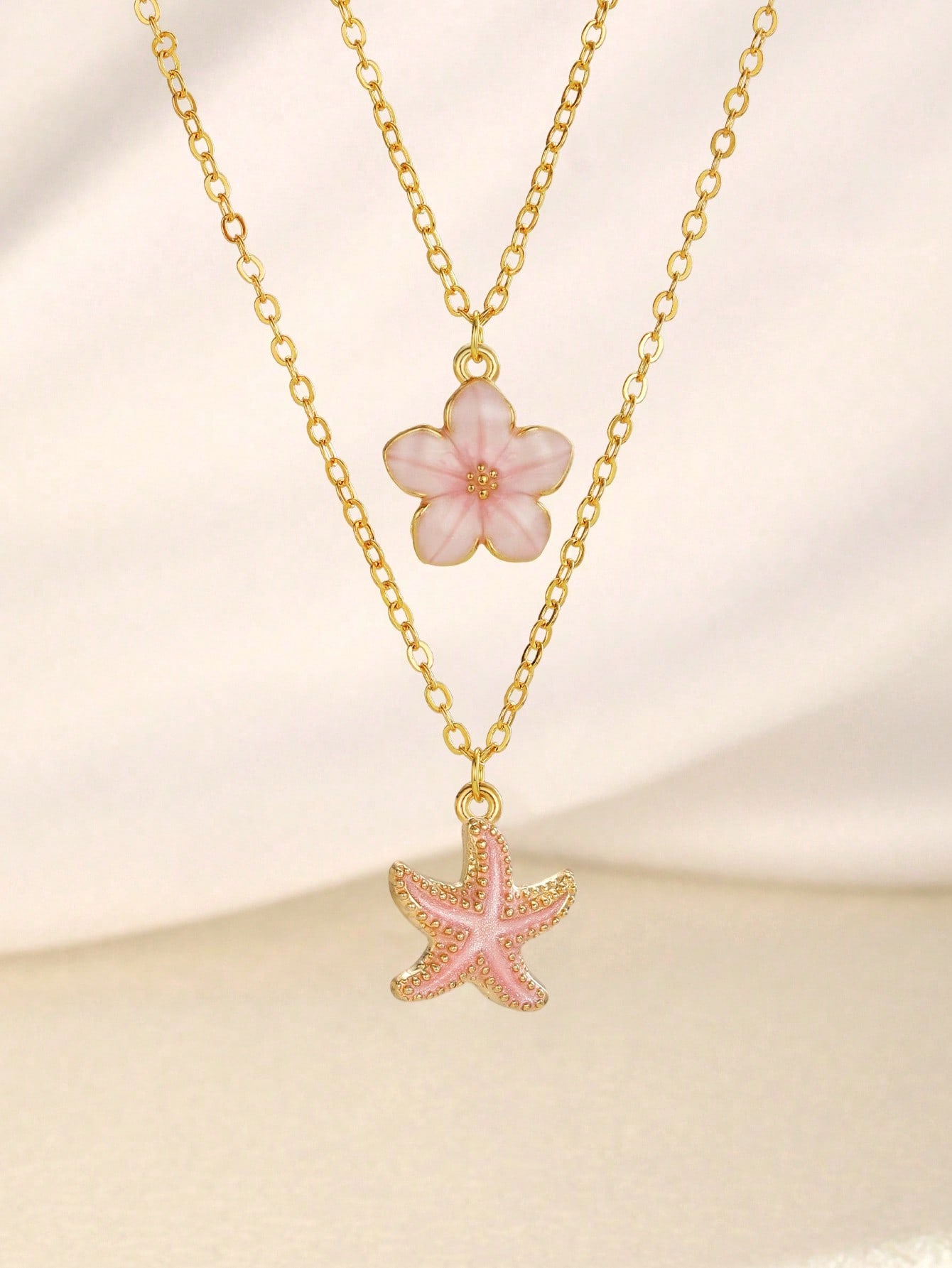 2Pcs/Set Sweet Flower & Starfish Pendant Necklace, Double Layer Gold Chain Beach Party Jewelry For Women United States
2Pcs/Set Sweet Flower & Starfish Pendant Necklace, Double Layer Gold Chain Beach Party Jewelry For Women United States