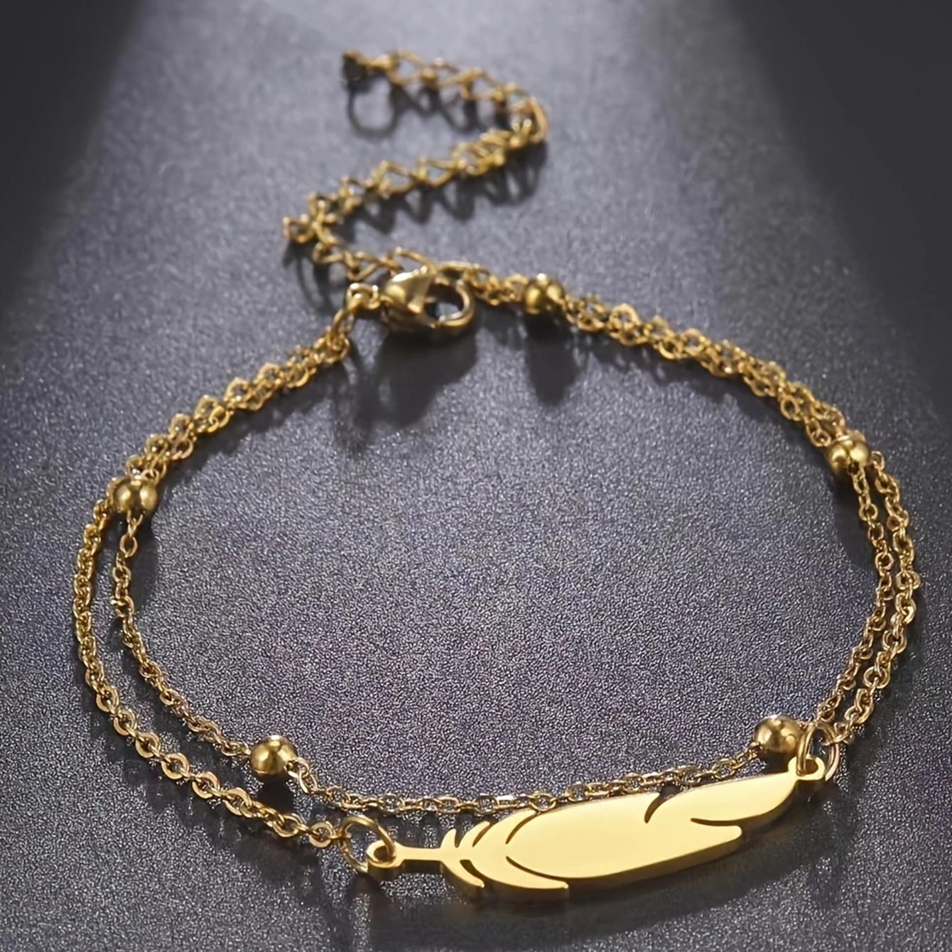 A Women s Summer Beach Feather Double-Layered Anklet with Beads, a Delicate and Stylish Accessory Suitable for Vacation and Everyday Wear
A Women s Summer Beach Feather Double-Layered Anklet with Beads, a Delicate and Stylish Accessory Suitable for Vacation and Everyday Wear