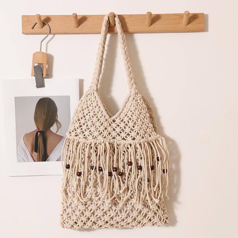 Cotton Thread Hollow Out Bead Woven Shoulder Bag Casual Large Capacity Handbag Fashionable Tassel Design Beach Bag
Cotton Thread Hollow Out Bead Woven Shoulder Bag Casual Large Capacity Handbag Fashionable Tassel Design Beach Bag