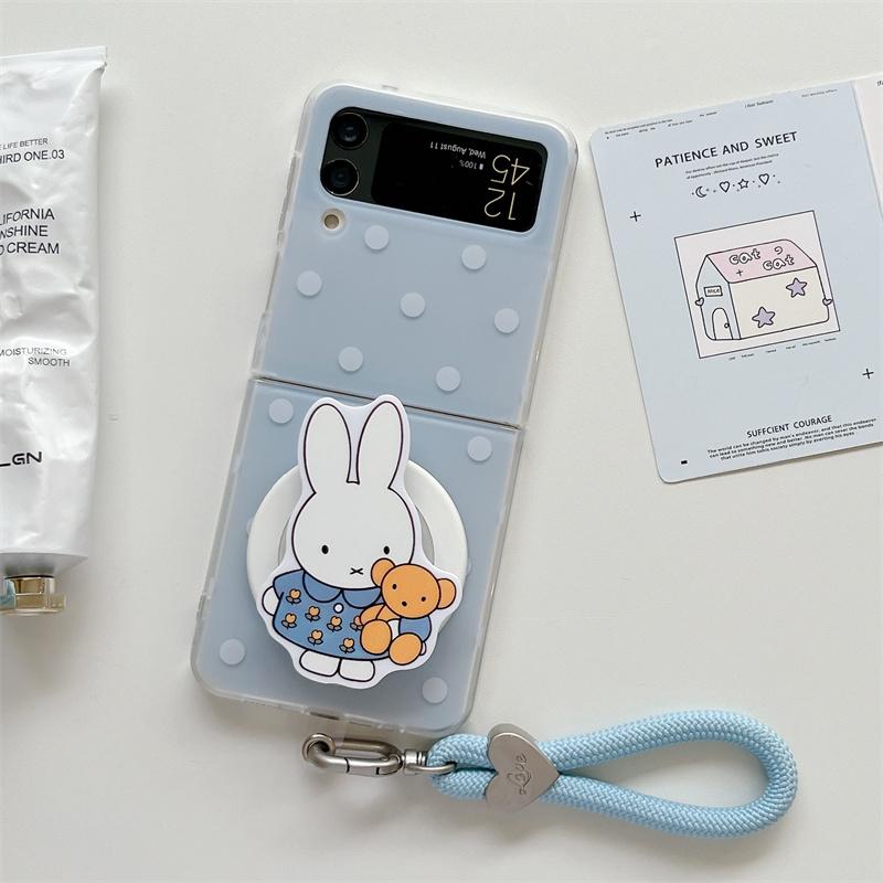 Cute Kawaii Miffy Rabbit Phone Case with Grip Holder Wrist Strap For Samsung Galaxy Z Flip 7 6 5 4 3 Magnetic Light Blue Polka For ZFlip7
Cute Kawaii Miffy Rabbit Phone Case with Grip Holder Wrist Strap For Samsung Galaxy Z Flip 7 6 5 4 3 Magnetic Light Blue Polka For ZFlip7