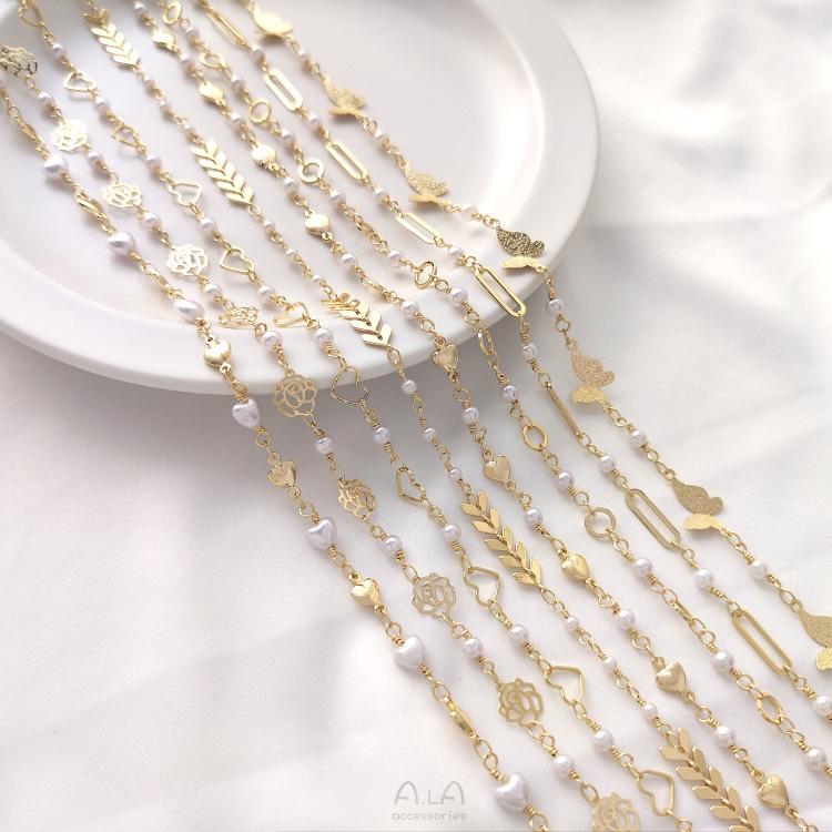 Цепочка ручной работы из золота 14 карат с персиковым сердцем и разделителем в виде бабочки с розой и жемчугом
Цепочка ручной работы из золота 14 карат с персиковым сердцем и разделителем в виде бабочки с розой и жемчугом