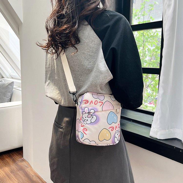 New girl shoulder bag student small bag canvas bag mobile phone bag cute cartoon messenger bag білий
New girl shoulder bag student small bag canvas bag mobile phone bag cute cartoon messenger bag білий