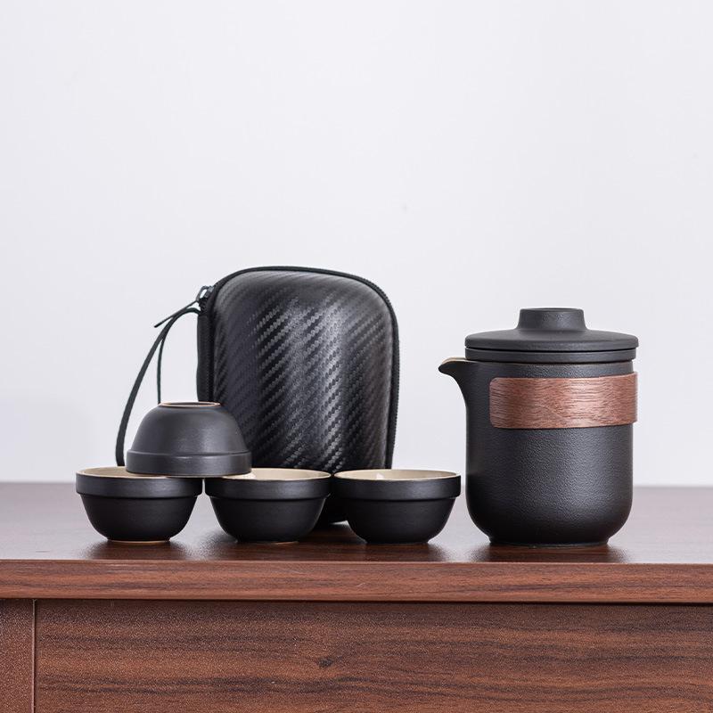 Travel tea set, gift, high-end ceramic portable outdoor tea, one pot of four cups, new Chinese express cup
Travel tea set, gift, high-end ceramic portable outdoor tea, one pot of four cups, new Chinese express cup