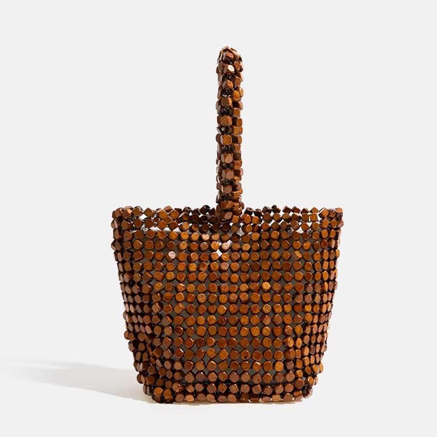 Vintage niche wooden beaded bucket bag 2026 new handwoven handbag summer vacation beach bag темно-коричневого
Vintage niche wooden beaded bucket bag 2026 new handwoven handbag summer vacation beach bag темно-коричневого