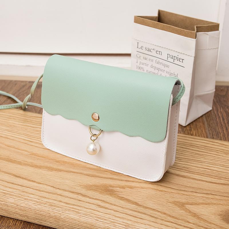Lady Pendant Pearl Travel Small Handbag Fashion Simply Pu Leather Crossbody Bag For Women Solid Color Shoulder Messenger Bag 19x13x4cm
Lady Pendant Pearl Travel Small Handbag Fashion Simply Pu Leather Crossbody Bag For Women Solid Color Shoulder Messenger Bag 19x13x4cm