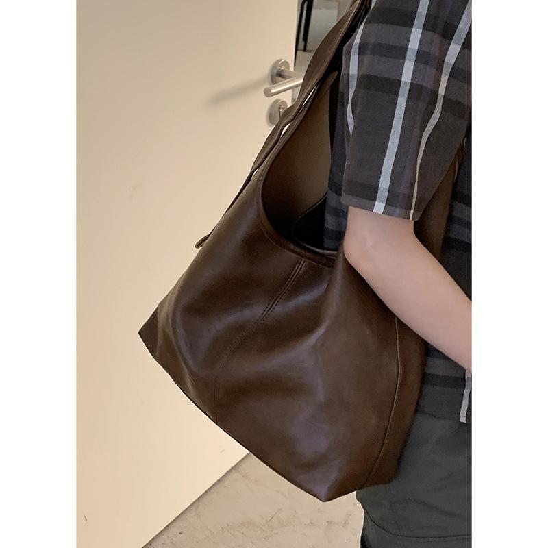 Винтажная сумка-ведро высокого класса женская 2025 новая модная однотонная простая на плечо подмышку универсальная сумка для通勤 коричневый
Винтажная сумка-ведро высокого класса женская 2025 новая модная однотонная простая на плечо подмышку универсальная сумка для通勤 коричневый