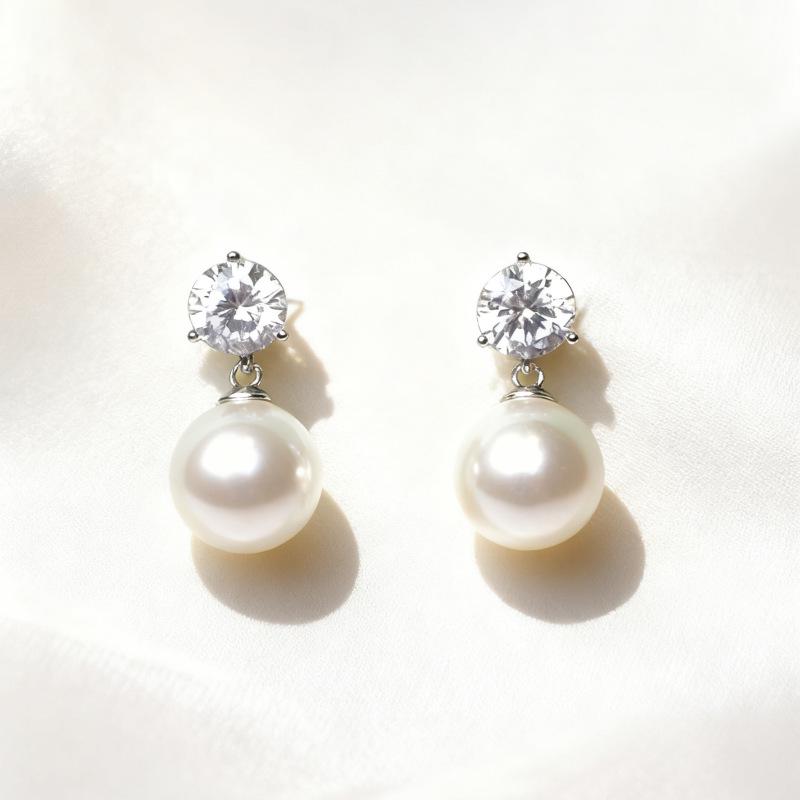 Elegant S925 Silver Needle Anti-Allergic White Copper Pearl Earrings with Single Diamond Studs Silver (Empty Base)
Elegant S925 Silver Needle Anti-Allergic White Copper Pearl Earrings with Single Diamond Studs Silver (Empty Base)