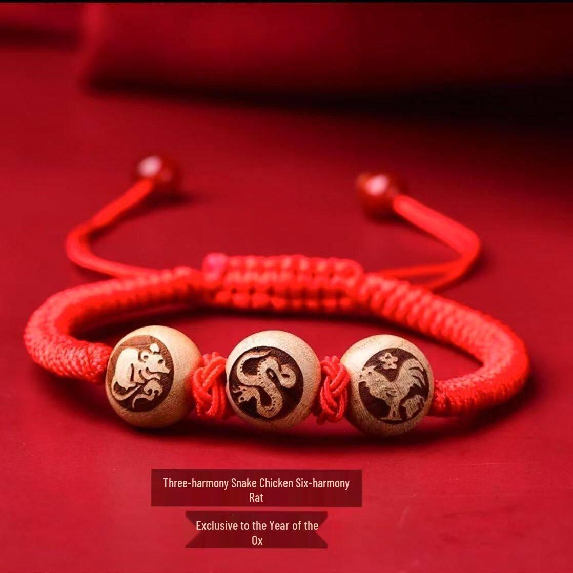 Zodiac Peach Wood Bracelet with Red String: Tiger, Rabbit, Monkey, Rooster, Pig, Sheep, Dragon - Harmony & Peace Lucky Charm
Zodiac Peach Wood Bracelet with Red String: Tiger, Rabbit, Monkey, Rooster, Pig, Sheep, Dragon - Harmony & Peace Lucky Charm