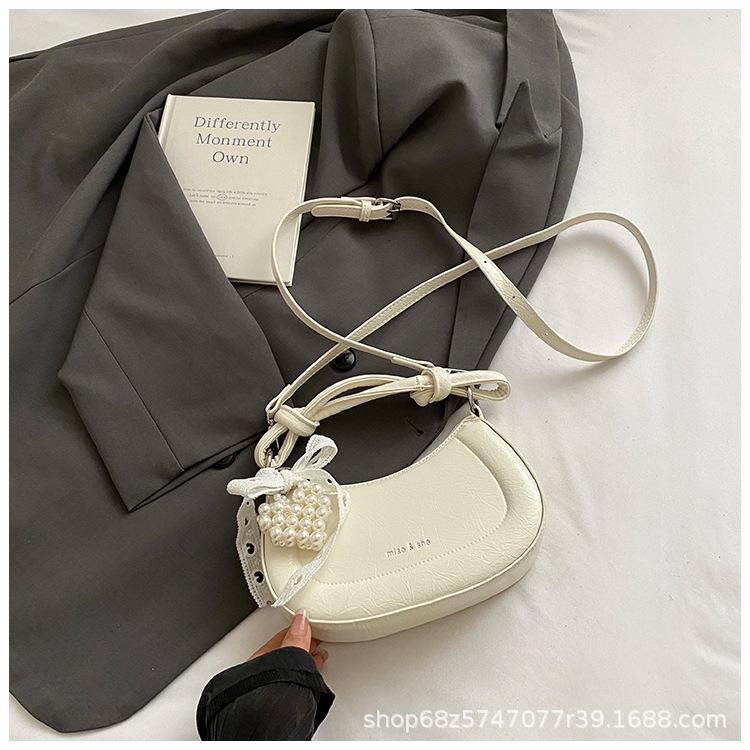 Handbag 2025 spring new niche ins shoulder temperament simple fashion Korean version messenger bag crescent bag women
Handbag 2025 spring new niche ins shoulder temperament simple fashion Korean version messenger bag crescent bag women