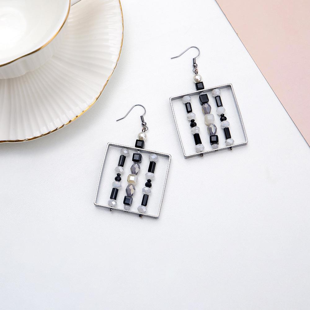 Women s French Design Square Beaded Earrings: Four Seasons Style with Hollowed-Out Mixed-Color Glass.
Women s French Design Square Beaded Earrings: Four Seasons Style with Hollowed-Out Mixed-Color Glass.