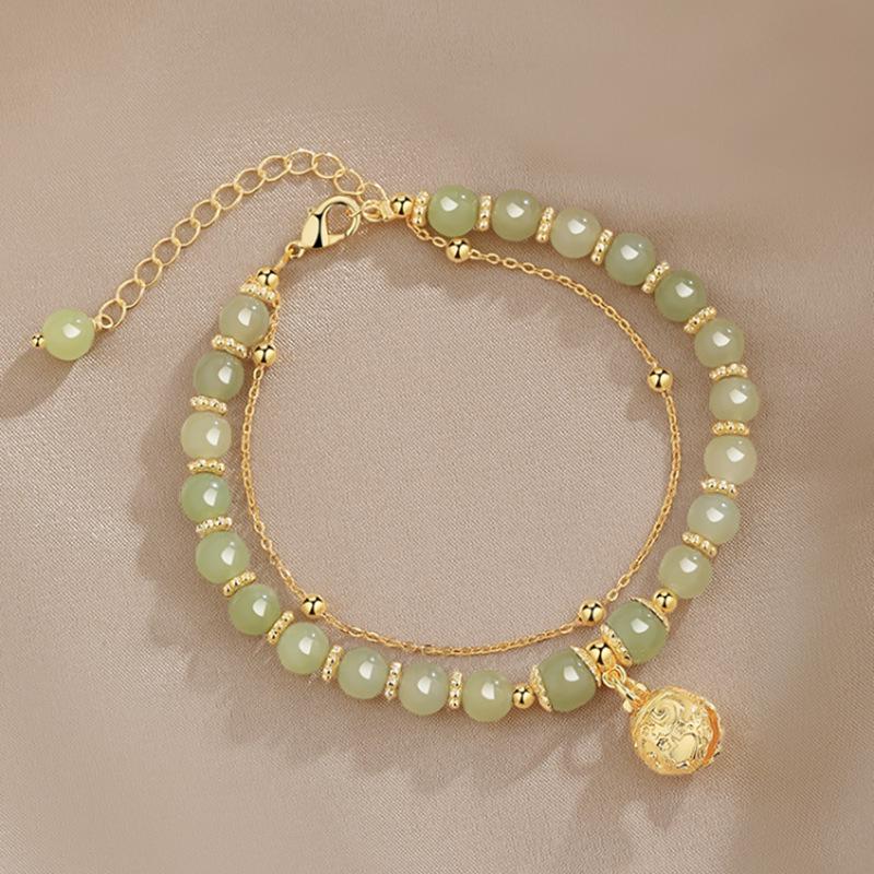High-End Natural Hetian Jade Wind Chime Bracelet for Women - Lucky Bead Palace Bell Design
High-End Natural Hetian Jade Wind Chime Bracelet for Women - Lucky Bead Palace Bell Design