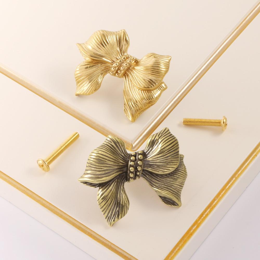 Luxury Bow Tie Brass Handle Gold Color Wardrobe Drawer Pulls Creative Cabinet Door Knobs Dresser Style 2
Luxury Bow Tie Brass Handle Gold Color Wardrobe Drawer Pulls Creative Cabinet Door Knobs Dresser Style 2