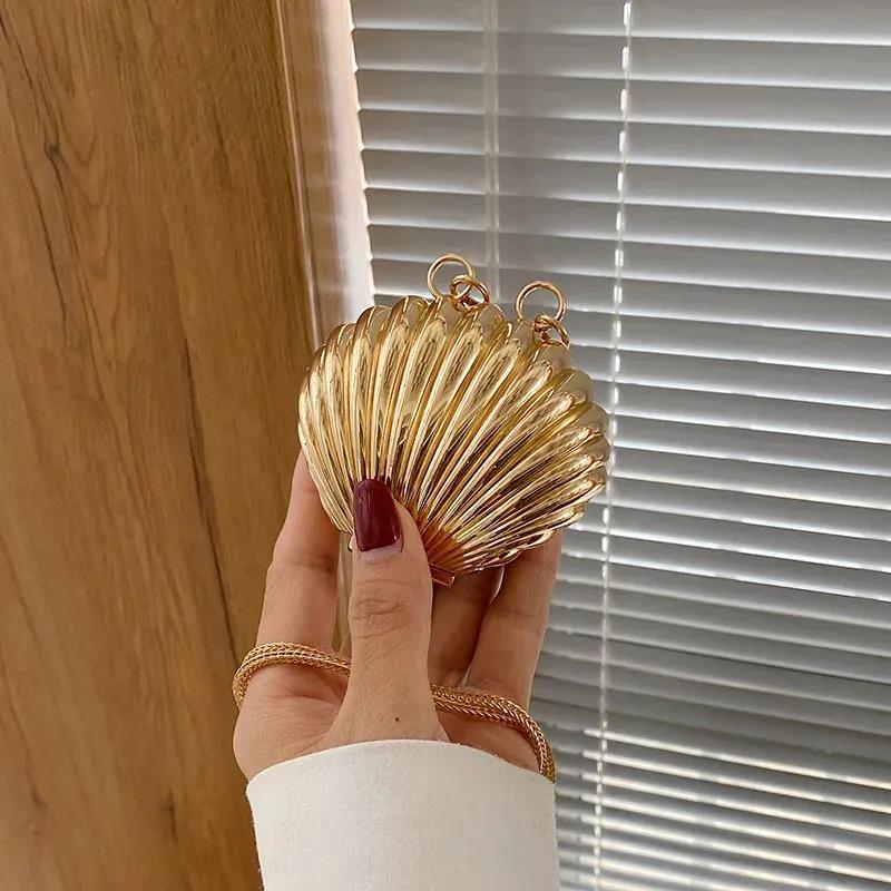 New Summer Lipstick Bags For Women Fashion Pearl Mini Purse Crossbody Bag High Quality Gold Shell Bag Designer Shoulder Bag золотой
New Summer Lipstick Bags For Women Fashion Pearl Mini Purse Crossbody Bag High Quality Gold Shell Bag Designer Shoulder Bag золотой