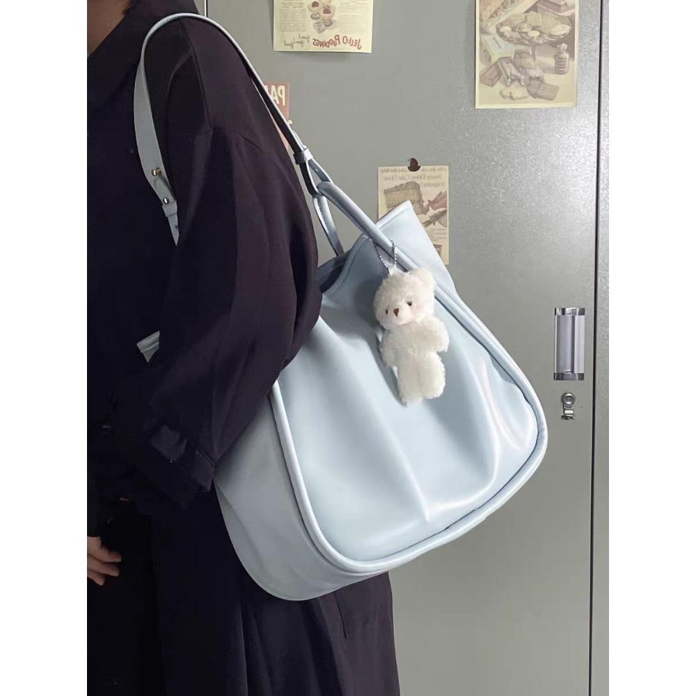Pink large-capacity tote bag 2022 spring and summer new commuter mother bag simple solid color portable shoulder bag women синій
Pink large-capacity tote bag 2022 spring and summer new commuter mother bag simple solid color portable shoulder bag women синій
