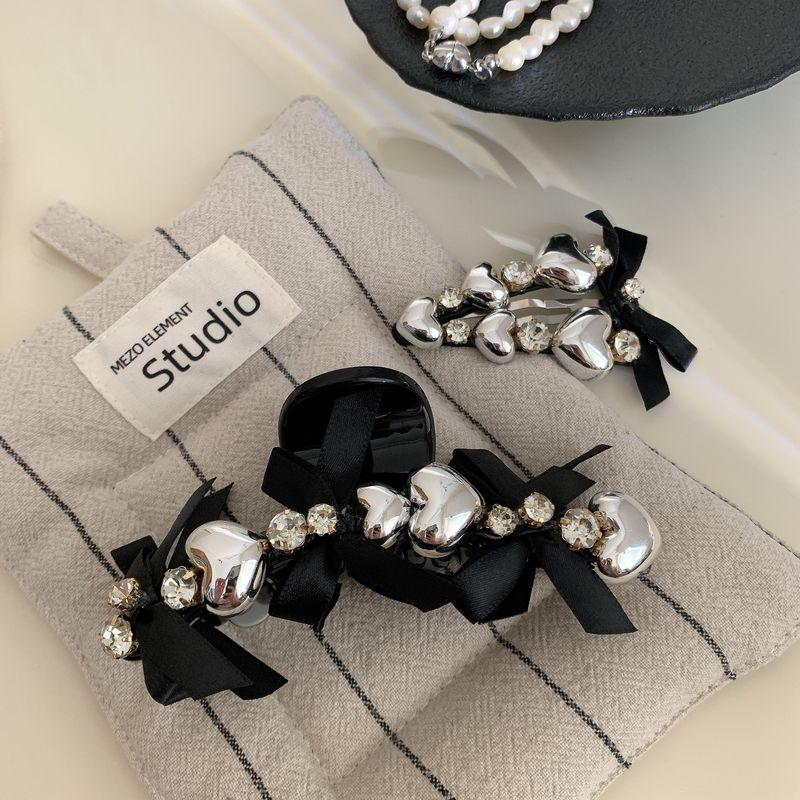 1pc Stylish and stylish silver heavy industry heart-shaped temperament black bow hair clip BB clip hair clip new hair accessory
1pc Stylish and stylish silver heavy industry heart-shaped temperament black bow hair clip BB clip hair clip new hair accessory