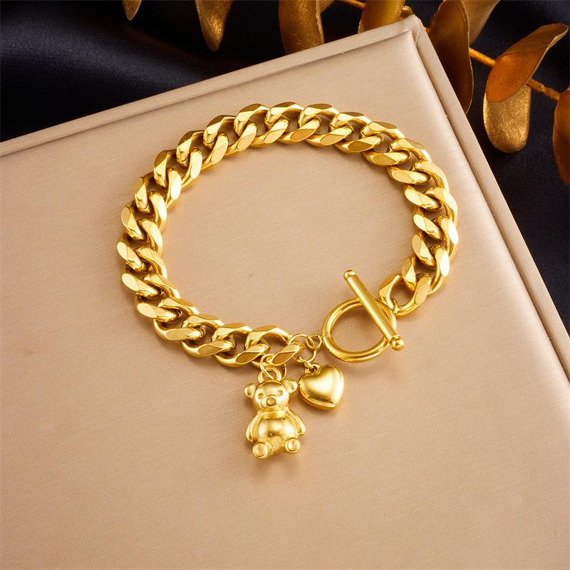 Gold Cuban Link Teddy Bear Heart Charm Bracelet – Playful Bold Jewelry, Sweet Love Gift for Women золотой
Gold Cuban Link Teddy Bear Heart Charm Bracelet – Playful Bold Jewelry, Sweet Love Gift for Women золотой