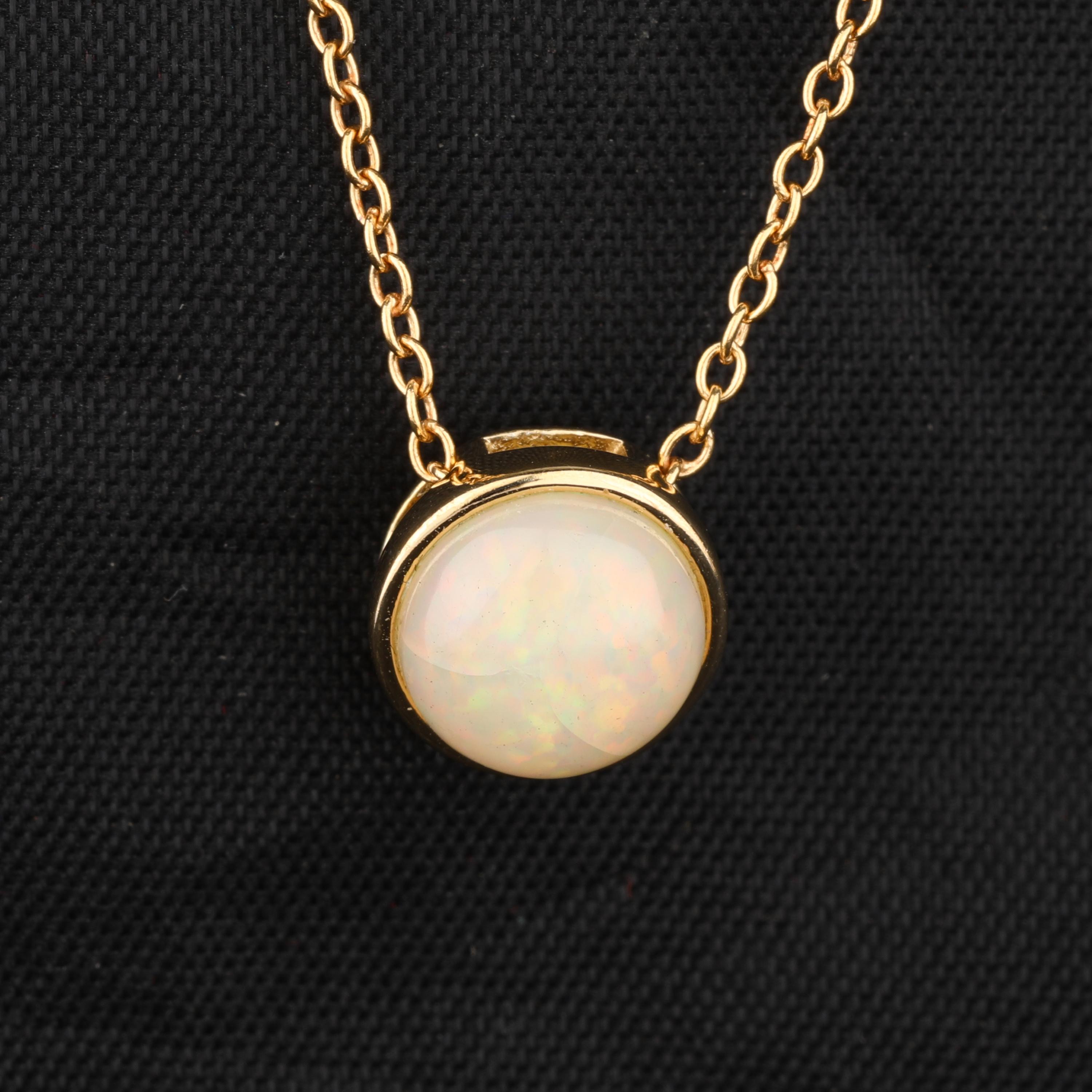 Natural Ethiopian Opal Pendant 925 Sterling Silver Gold Plated Round Cabochon Handmade Fine Jewelry Gift for Her
Natural Ethiopian Opal Pendant 925 Sterling Silver Gold Plated Round Cabochon Handmade Fine Jewelry Gift for Her