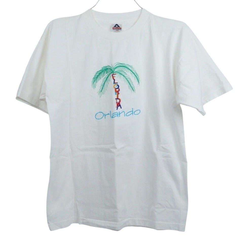 VTG 90s Florida Orlando Palm Tree Embroidered T-Shirt White S.S. Size M/L L
VTG 90s Florida Orlando Palm Tree Embroidered T-Shirt White S.S. Size M/L L