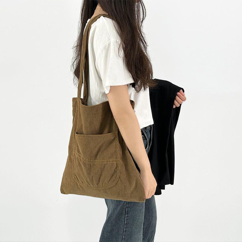 Korean-Style Retro Corduroy Single Shoulder Tote – Large Capacity Casual Canvas Bag коричневий
Korean-Style Retro Corduroy Single Shoulder Tote – Large Capacity Casual Canvas Bag коричневий