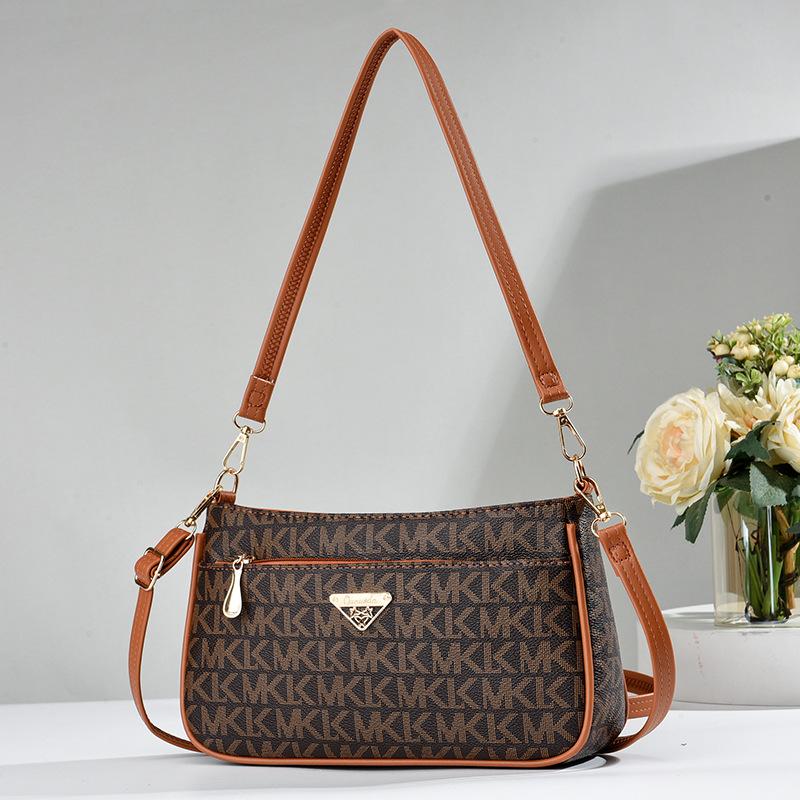 nderarm bag women s new fashion messenger trend large capacity texture middle-aged and elderly shoulder women s bag
nderarm bag women s new fashion messenger trend large capacity texture middle-aged and elderly shoulder women s bag
