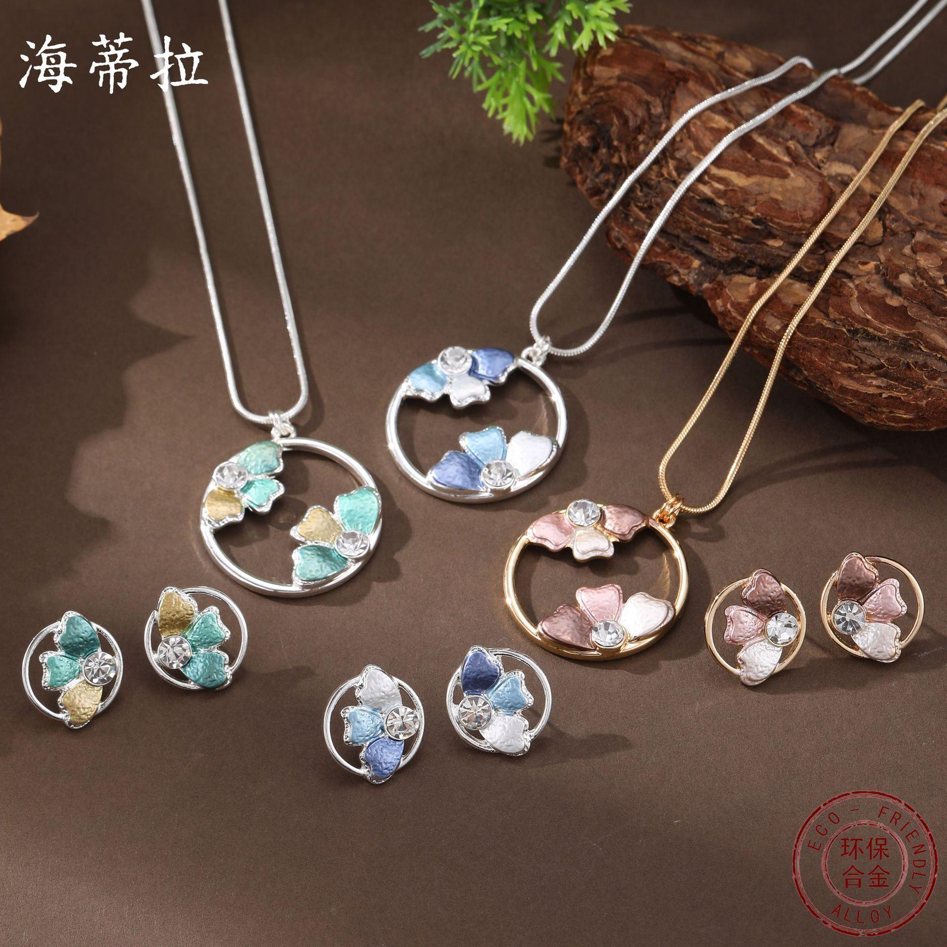New enamel round hollow petal stud earrings pendant set women s fashion high-end petal necklace
New enamel round hollow petal stud earrings pendant set women s fashion high-end petal necklace