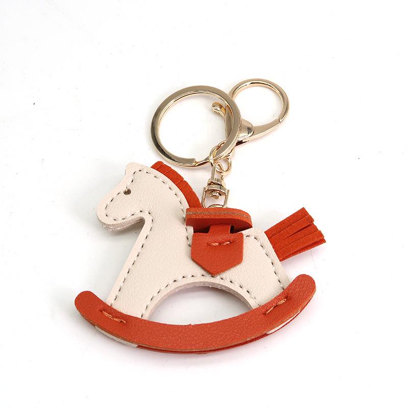 Douyin Hot Selling Cartoon Leather Rocking Horse Keychain - Little Wooden Horse Bag Charm Accessory
Douyin Hot Selling Cartoon Leather Rocking Horse Keychain - Little Wooden Horse Bag Charm Accessory